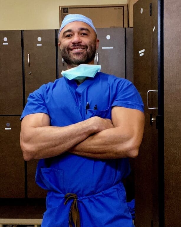 Photo of Doctor Agadzi in scrubs